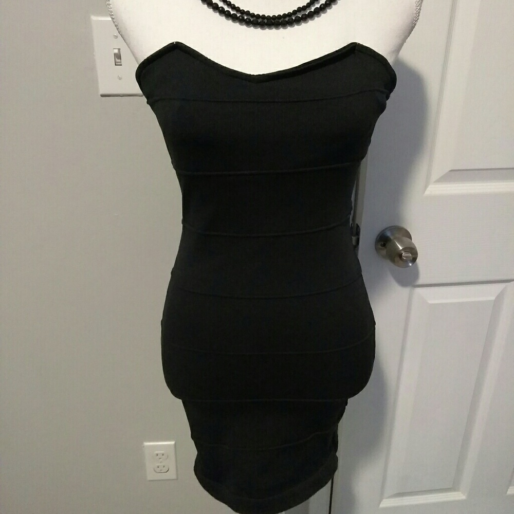 Women's small strapless black dress